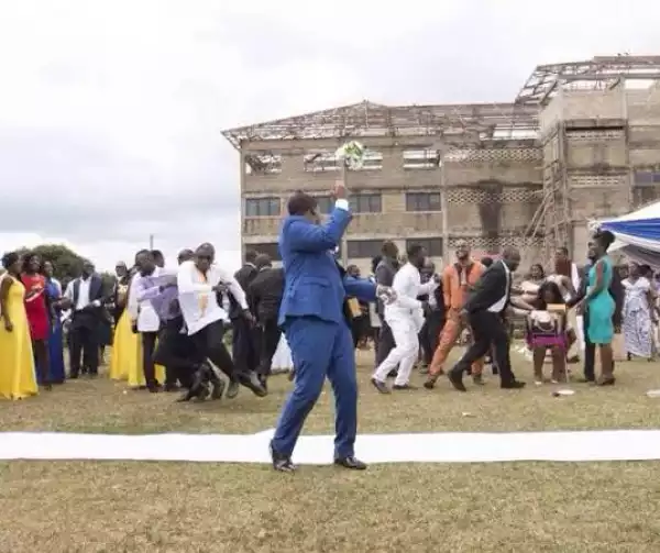 Hilarious Photo: Groom Throws Bouquet At Friends. See What The Guys Did